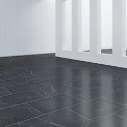 FAUS Black Marble - Industry Tile 8mm Laminate Flooring (217071) -Famous Flooring Store black marble industry tile 8mm laminate flooring 217071 p84220 187623 image