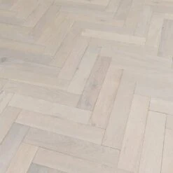 Liberty Floors Ivory White Oak - Herringbone Parquet 14mm Engineered Real Wood Flooring (219387) -Famous Flooring Store ivory white oak herringbone parquet 14mm engineered real wood flooring 219387 p85835 201397 image