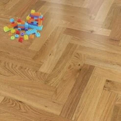 Liberty Floors Natural Oak - Herringbone Parquet 14mm Engineered Real Wood Flooring (219384) -Famous Flooring Store natural oak herringbone parquet 14mm engineered real wood flooring 219384 p85832 201387 image