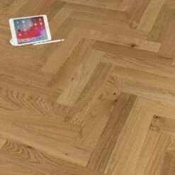 Liberty Floors Natural Oak Smoked - Herringbone Parquet 14mm Engineered Real Wood Flooring (219385) -Famous Flooring Store natural oak smoked herringbone parquet 14mm engineered real wood flooring 219385 p85833 201390 image
