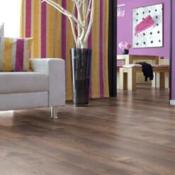 Kronotex Pettersson Dark Oak - Amazone 10mm Laminate Flooring (160229) -Famous Flooring Store pettersson dark oak amazone 10mm laminate flooring 160229 p54218 143286 image