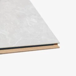 Liberty Floors White Granite - Universo 8mm Laminate Flooring (263458) -Famous Flooring Store white granite universo 8mm laminate flooring 263458 p113496 237082 image